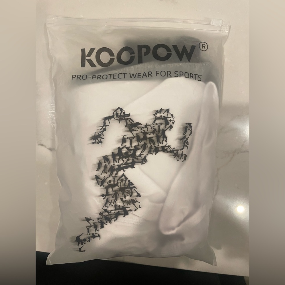 Koopow size Medium 3 pack of boys protective briefs for sports.